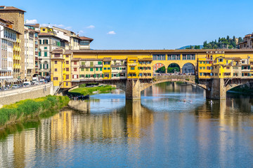 Fototapeta na wymiar Houses built on the Ponte Vecchio (Old Bridge) over river Arno in Florence