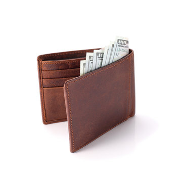 Brown wallet with money isolated on white