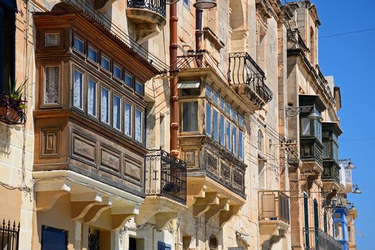 Buildings with interesting balconies and windows, Vittoriosa, Malta.