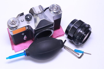 Tools for repairing camera, remove dust. camera cleaning services conceptual image