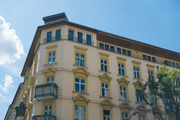 Fototapeta premium yellow corner house in vintage colors