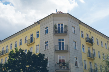 corner house with white and yellow facade
