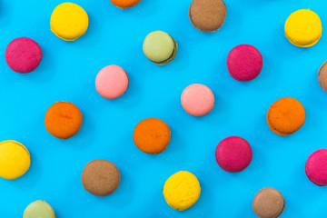 Vibrant pattern, macaroons on bright background