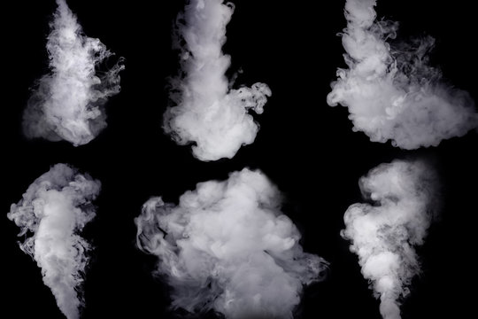 Set of abstract white smoke against dark background