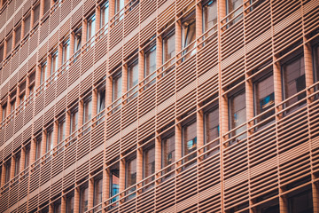 Fototapeta premium detailed view of red facade - finance or office building