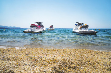 Three jet ski boats at the sea shore © pirke