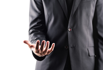 cropped view of businessman in suit with open hand, isolated on white