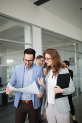 Group of business people collaborating in business office