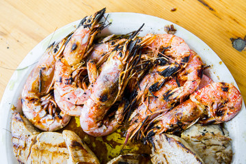 Shrimp and tuna fillet on a plate