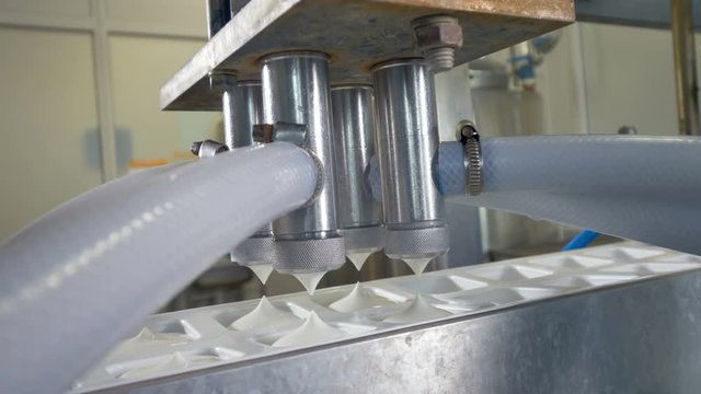 Sour cream hydraulic packer at work. 