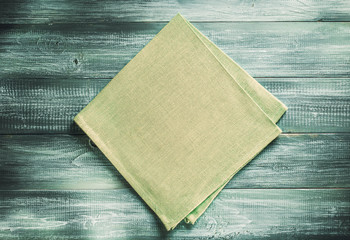 cloth napkin on wooden background