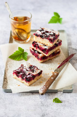 Black Currant Slice with a Glass of Tea