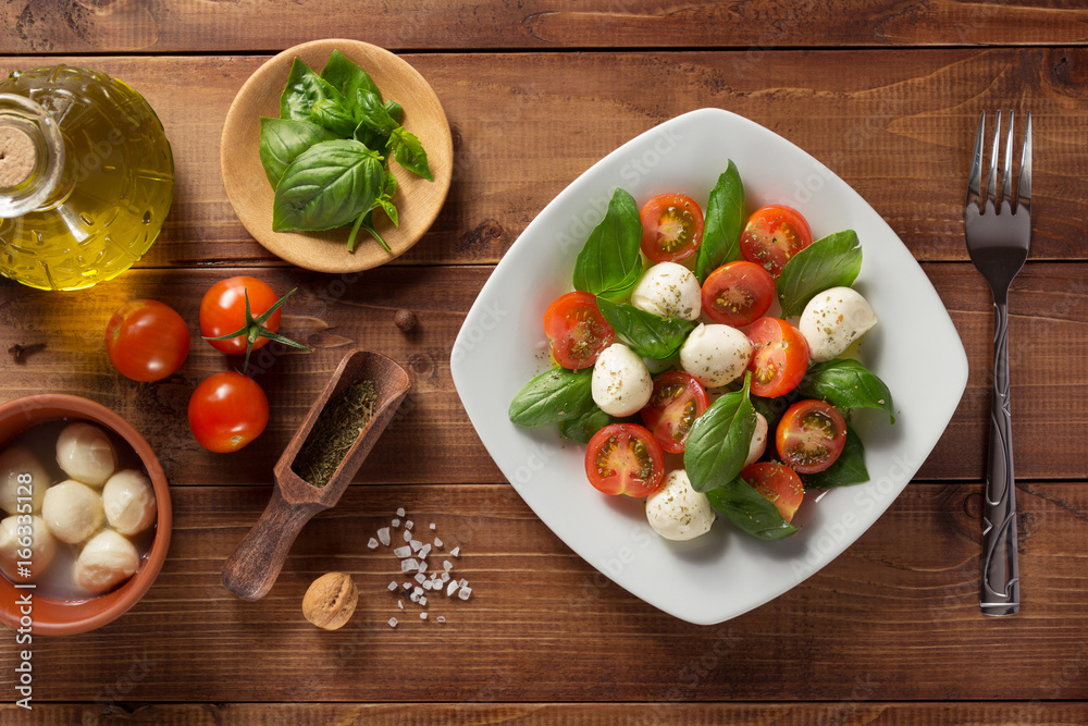 Canvas Prints caprese salad and ingredients at wood