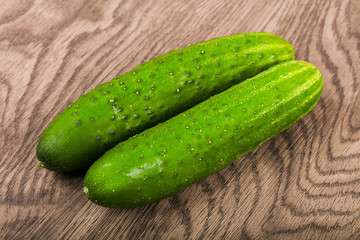 Two green cucumbers