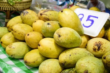 Ripe mango for sales at the bazaar in countryside