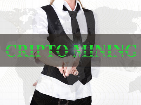 businesswoman in a jacket and tie pressing cripto mining button of a virtual screen. exchange and production of crypto currency concept
