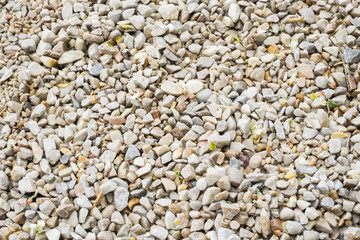 Close-up texture of small colorful gravel consisted of little stones
