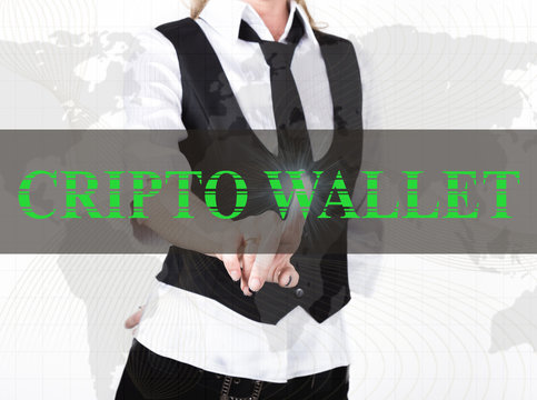businesswoman in a jacket and tie pressing cripto wallet button of a virtual screen. exchange and production of crypto currency concept