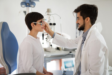 Girl woman in ophthalmology clinic for diopter detection