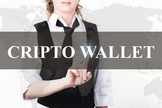 businesswoman in a jacket and tie pressing cripto wallet button of a virtual screen. exchange and production of crypto currency concept