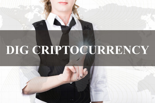 businesswoman in a jacket and tie pressing dig criptocurrency button of a virtual screen. exchange and production of crypto currency concept