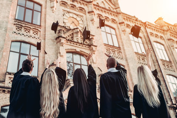 Naklejka premium Graduates near university