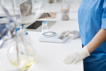 Close up of electronic scales being in use