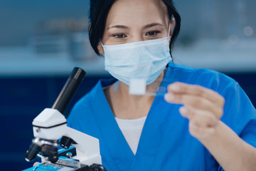 Professional nice biologist doing a research job