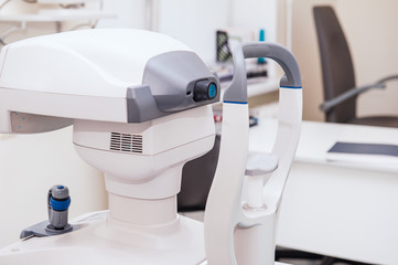 Modern tonometer in ophthalmologist's office. Optical medical equipment concept. Selective focus, close up