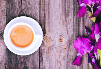 White cup of coffee and a saucer