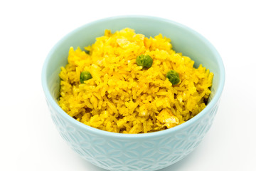 Homemade Chinese fried rice with vegetables and fried eggs