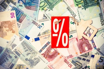 The symbol of the house lies on the background of the American currency 