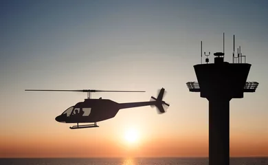 Selbstklebende Fototapeten Helikopter bei Sonnenuntergang © ErsErg