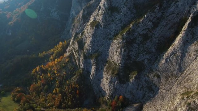 Aerial drone slow shot revealing Scarita Belioara Nature Reserve in apuseni, Mountains, Romania.	Scărița Belioara is a geological and floristic nature reserve with impressive limestone cliffs and edel
