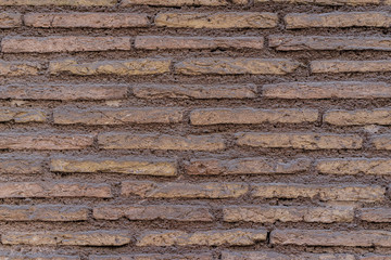 Ancient old red brick wall texture as background