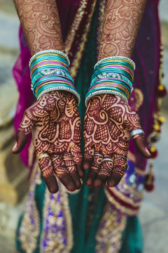 Henna-painted hands, India