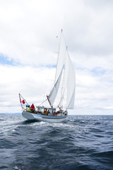 Schooner Passing Cloud Under Sail