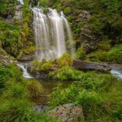 Fototapeta na wymiar The Xestosa waterfall in the Xistral mountain range