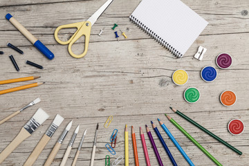 school accessories on a light wooden background