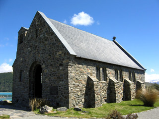 Fototapeta premium Old Stone Church under a Blue Sky