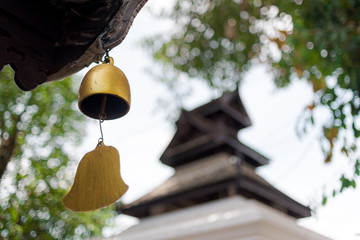 asian bronze bell in the garden with japan castle background