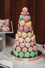 Homemade macaroons cackes on stand