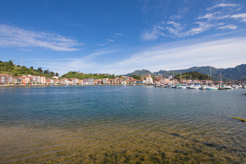 Fototapeta premium Ribadesella city waterfront and seaport next to Sella River in Asturias Spain Europe 