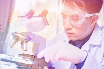 Science and technology concept ,Serious clinician student studying chemical element in...