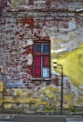 Grungy Brick Wall and red window
