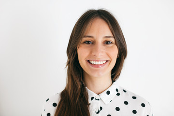 Young beautiful woman portrait over white.