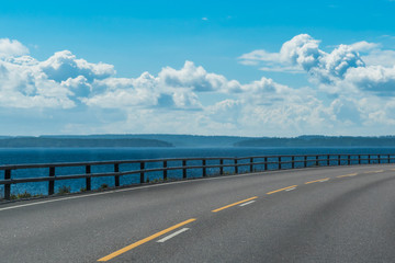 Coastal road along Finnish bay at Lahti region, Finland.