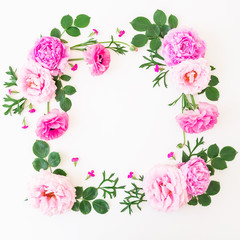 Floral frame made of pink flowers on white background. Floral composition. Flat lay, top view.