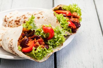 Tortilla with mincemeat and beans