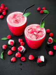 Raspberry ice cold refreshing cocktail with berries. Tasty cocktail